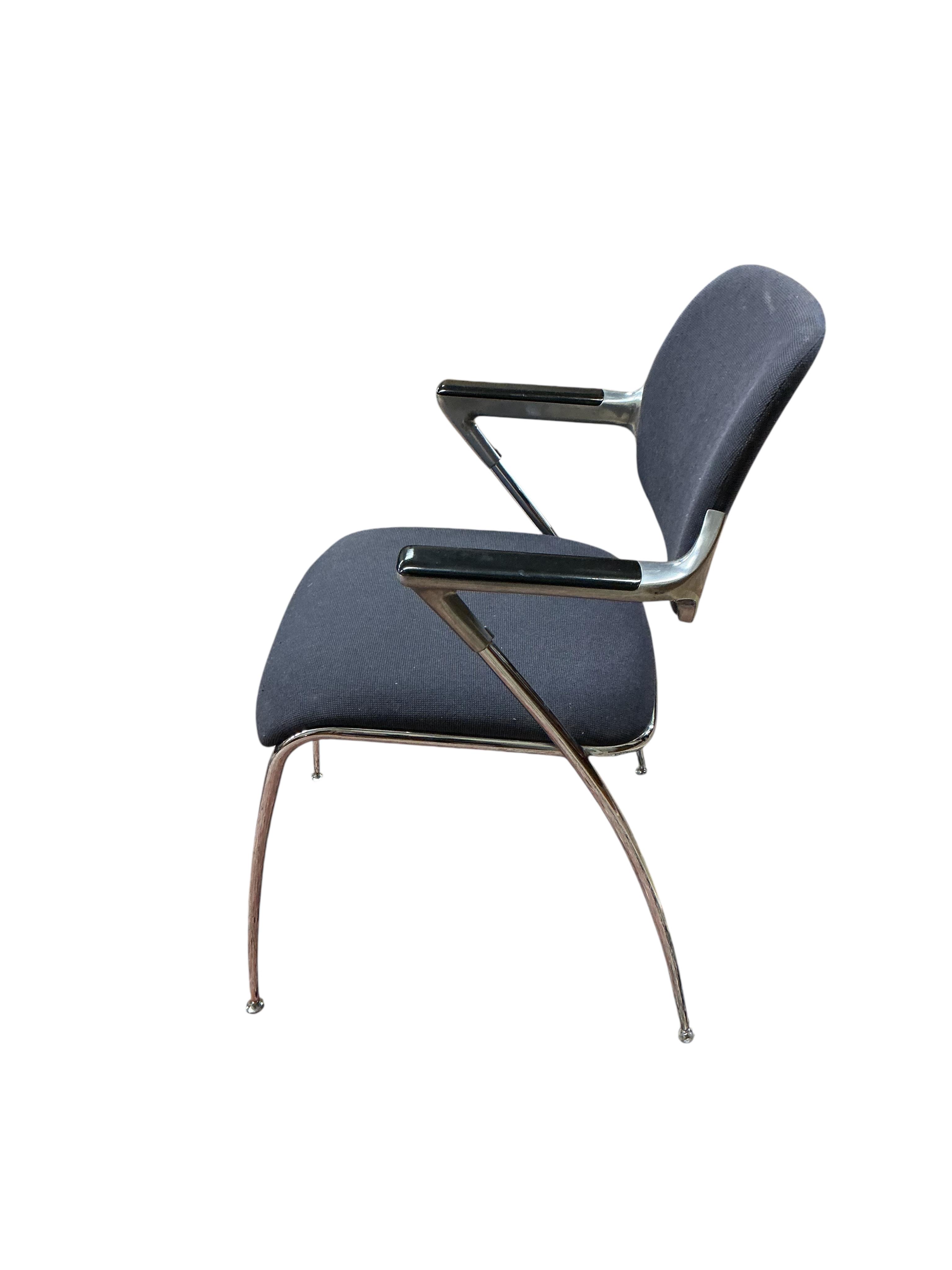 A set of four Brunner mid century upholstered chrome elbow chairs